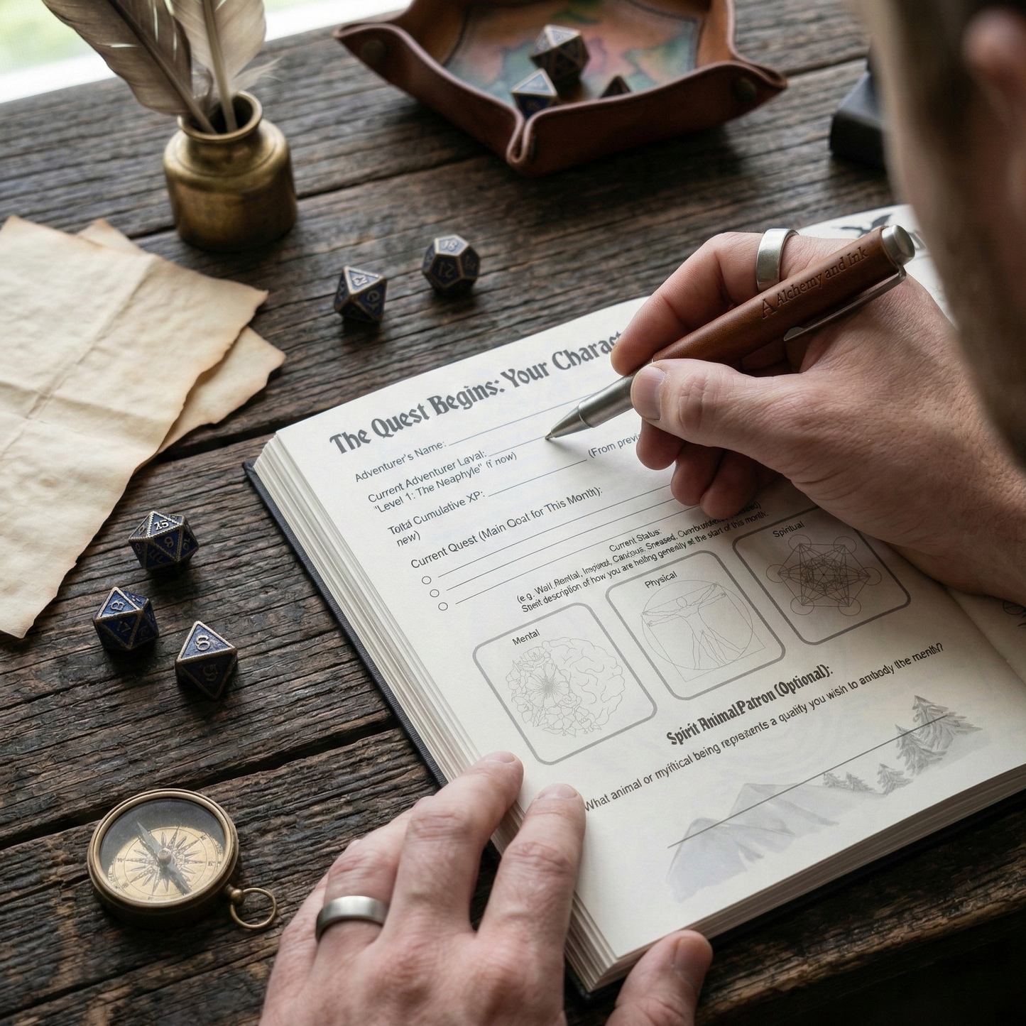A close-up lifestyle shot of a person's hands writing in a fantasy character journal on a rustic wooden table, surrounded by gaming accessories like dice, a compass, and parchment.